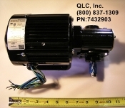 A picture of an electric motor with the words qlc, inc. And a tape measure