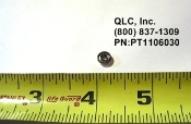 A metal ball is shown next to a ruler.